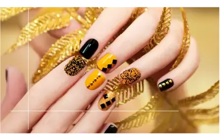 Long nails with gold nail art