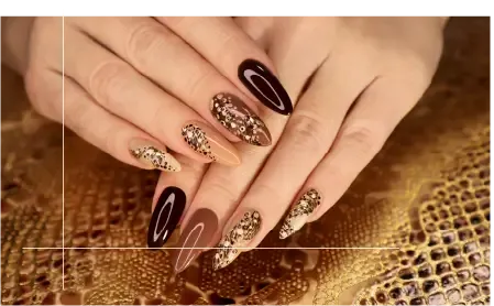 Dark almond nails with glitter accents